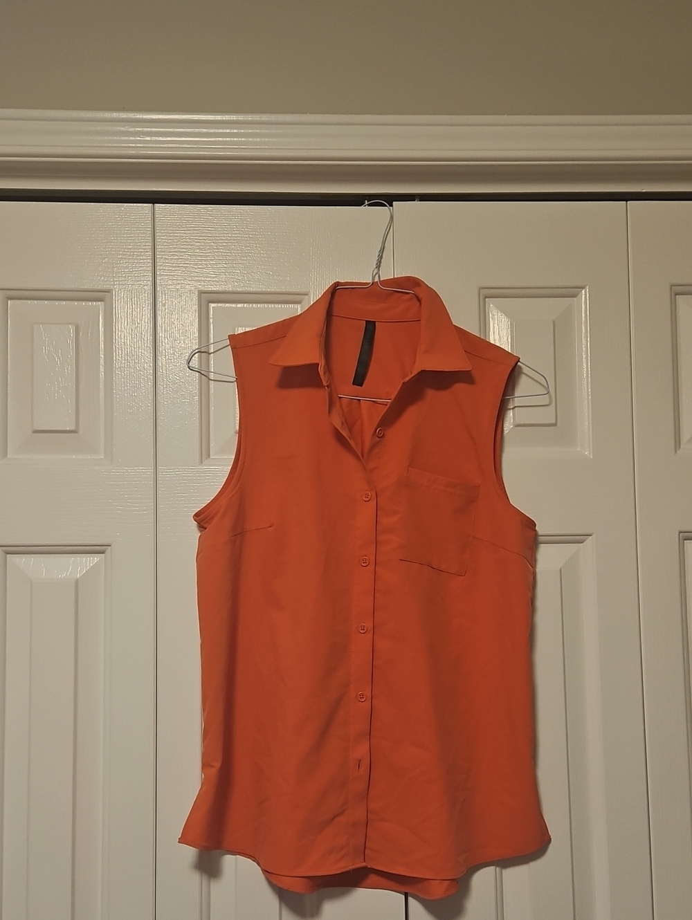 GAIAM Sleeveless Collared Button-Up Blouse in Coral